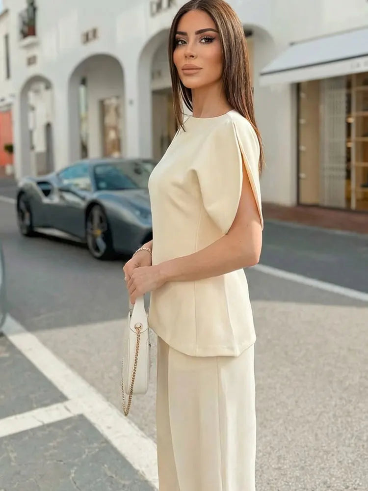 Puff Sleeve Blouse -Asymmetrical Hem